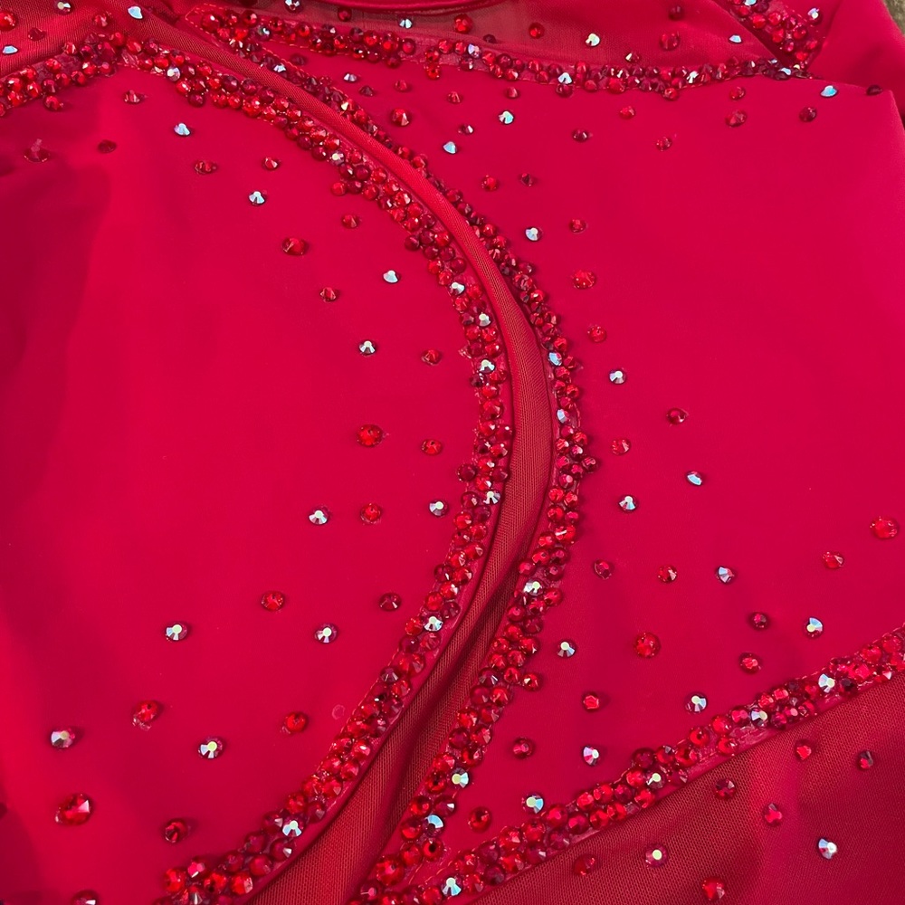 This is a red, rhinestoned, custom leotard. It’s a size adult XS. - Picture 2 of 4